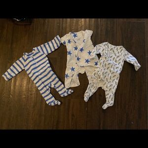 Set of three Aden and Anais outfits.